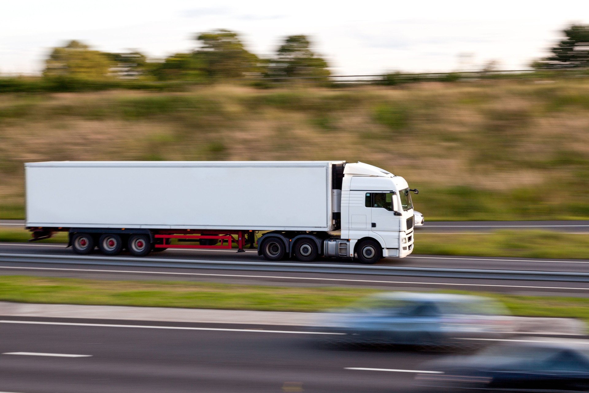 industrial lorry on motorway with motion blur